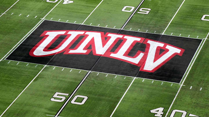 The UNLV Rebels logo at midfield during the Mountain West Championship at Allegiant Stadium. Mandatory Credit: Kirby Lee-Imagn Images