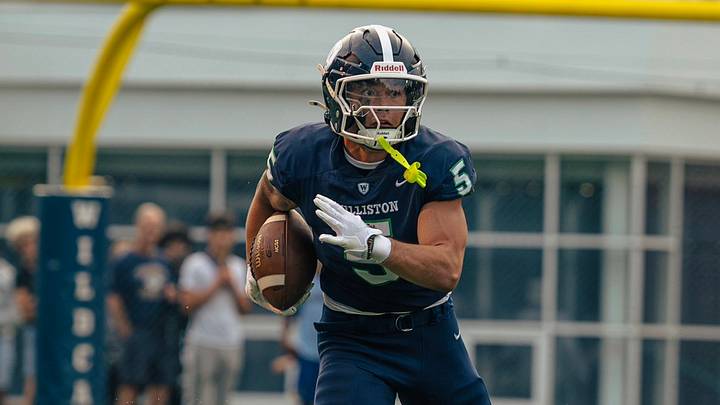 Nate Ellis takes the ball down the field Nate Ellis takes the ball down the field