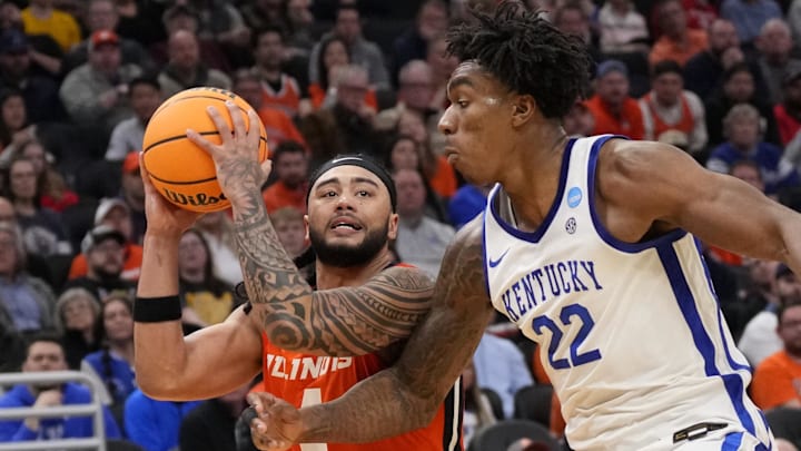 Mar 23, 2025; Milwaukee, WI, USA;  Illinois Fighting Illini guard Kylan Boswell (4) controls the ball against Kentucky Wildcats center Amari Williams (22) during the second half in the second round of the NCAA Tournament at Fiserv Forum. Mandatory Credit: Jeff Hanisch-Imagn Images
