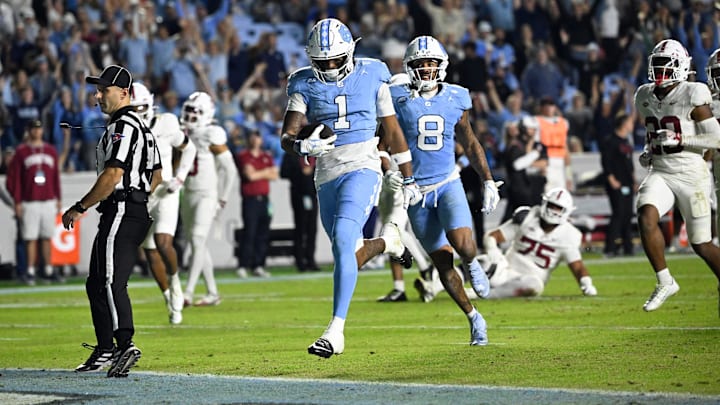 Nov 8, 2025; Chapel Hill, North Carolina, USA; North Carolina Tar Heels wide receiver Jordan Shipp (1) scores a touchdown in the fourth quarter at Kenan Stadium. Mandatory Credit: Bob Donnan-Imagn Images