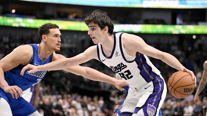 Feb 26, 2026; Dallas, Texas, USA; Sacramento Kings center Maxime Raynaud (42) looks to move the ball past Dallas Mavericks forward Dwight Powell (7) during the second half at the American Airlines Center. Mandatory Credit: Jerome Miron-Imagn Images Feb 26, 2026; Dallas, Texas, USA; Sacramento Kings center Maxime Raynaud (42) looks to move the ball past Dallas Mavericks forward Dwight Powell (7) during the second half at the American Airlines Center. Mandatory Credit: Jerome Miron-Imagn Images