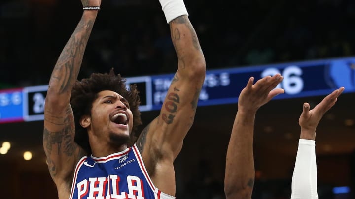 Apr 6, 2024; Memphis, Tennessee, USA; Philadelphia 76ers Kelly Oubre Jr. (9) shoots as Memphis Grizzlies guard Zavier Simpson (2) defends during the first half at FedExForum. Mandatory Credit: Petre Thomas-USA TODAY Sports