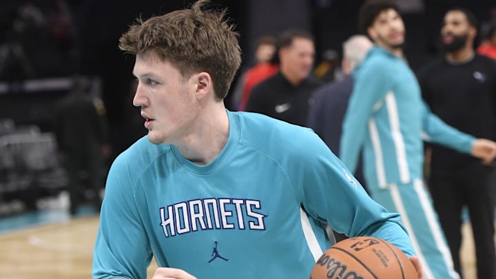 Jan 7, 2026; Charlotte, North Carolina, USA;  Charlotte Hornets forward Kon Knueppel (7) warms up before the game against the Toronto Raptors at the Spectrum Center. 