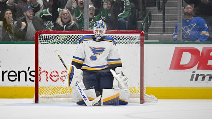 Apr 17, 2024; Dallas, Texas, USA; St. Louis Blues goaltender Jordan Binnington (50) reacts to giving up a goal to Dallas Stars left wing Jason Robertson (21)during the overtime shootout at the American Airlines Center. Mandatory Credit: Jerome Miron-Imagn Images