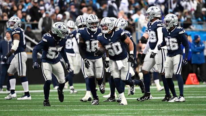 Dallas Cowboys linebacker Eric Kendricks (50) reacts after making an interception in the second quarter at Bank of America Stadium. 
