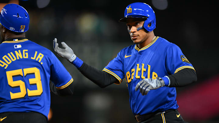 Seattle Mariners third baseman Jorge Polanco celebrates after hitting a single against the Athletics on March 28 at T-Mobile Park.