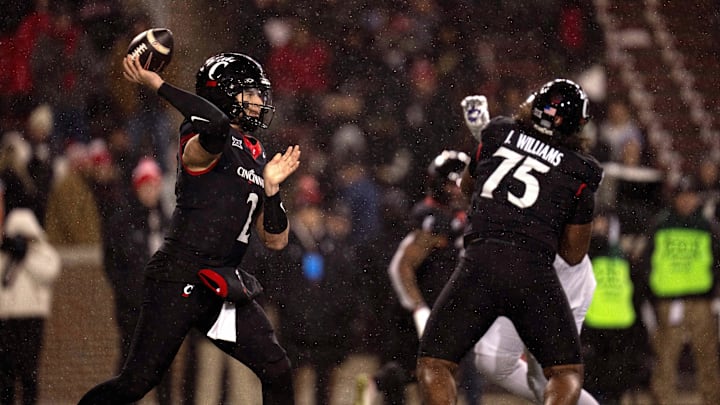 Nov 30, 2024; Cincinnati, Ohio, USA; Cincinnati Bearcats quarterback Brendan Sorsby (2) throws a pass against the TCU Horned Frogs in the third quarter at Nippert Stadium. Mandatory Credit: Albert Cesare/USA TODAY Network via Imagn Images