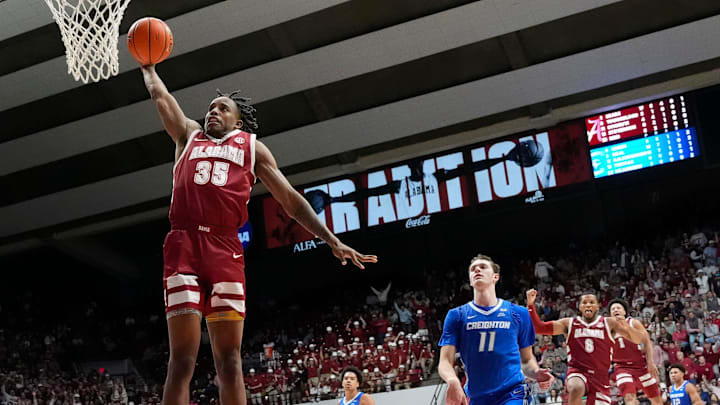 Dec 14, 2024; Tuscaloosa, AL, USA; Alabama forward Derrion Reid (35) gets a breakaway dunk with Creighton center Ryan Kalkbrenner (11) too far behind to defend the dunk at Coleman Coliseum. Alabama defeated Creighton 83-75. Mandatory Credit: Gary Cosby Jr.-Tuscaloosa News Dec 14, 2024; Tuscaloosa, AL, USA; Alabama forward Derrion Reid (35) gets a breakaway dunk with Creighton center Ryan Kalkbrenner (11) too far behind to defend the dunk at Coleman Coliseum. Alabama defeated Creighton 83-75. Mandatory Credit: Gary Cosby Jr.-Tuscaloosa News