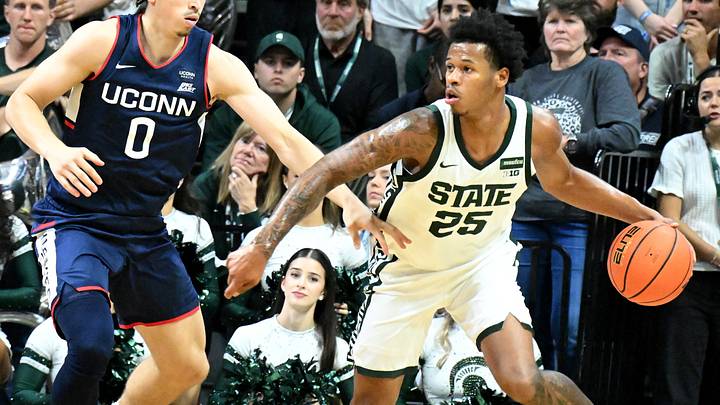 Oct 20, 2026; East Lansing, MI, USA; Michigan State Spartans guard Jasiah Jervis (25) handles the ball while guarded by UConn Huskies guard Junior County (0) during the first half at Breslin Center. Mandatory Credit: Dale Young-Imagn Images Oct 20, 2026; East Lansing, MI, USA; Michigan State Spartans guard Jasiah Jervis (25) handles the ball while guarded by UConn Huskies guard Junior County (0) during the first half at Breslin Center. Mandatory Credit: Dale Young-Imagn Images