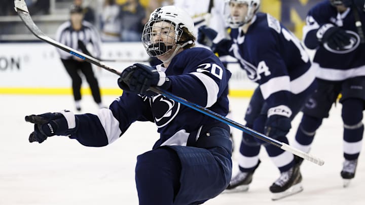 Mar 7, 2025; Ann Arbor, MI, USA; Penn State forward JJ Wiebusch (20) celebrates his game winning goal in overtime against the michigan wolverines during a Big Ten Tournament quarter final game at Yost Arena. Mandatory Credit: Rick Osentoski-Imagn Images Mar 7, 2025; Ann Arbor, MI, USA; Penn State forward JJ Wiebusch (20) celebrates his game winning goal in overtime against the michigan wolverines during a Big Ten Tournament quarter final game at Yost Arena. Mandatory Credit: Rick Osentoski-Imagn Images