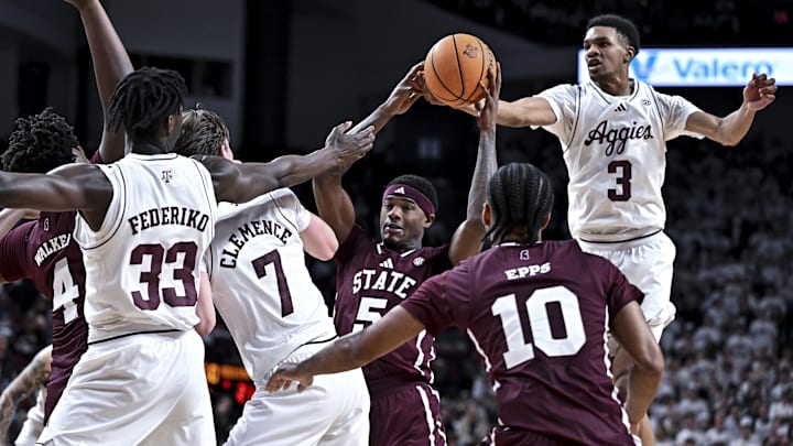 Mississippi State Bulldogs guard Shawn Jones Jr. (5) and Texas A&M Aggies guard Rylan Griffen (3) go for a rebound during the first half at Reed Arena.