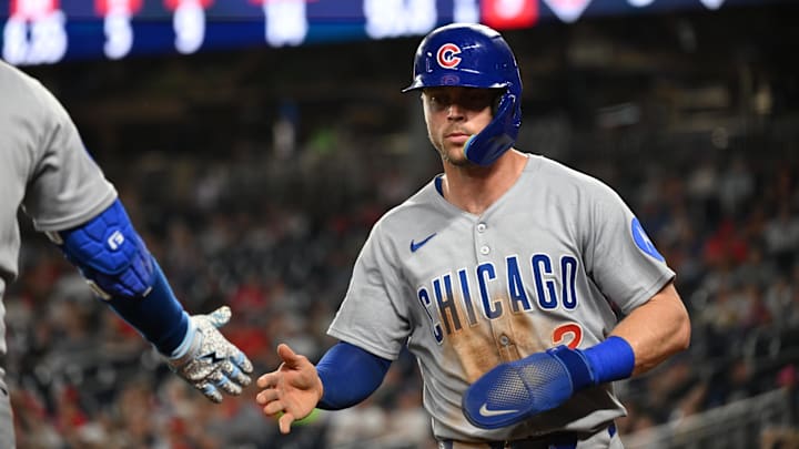 Jun 5, 2025; Washington, District of Columbia, USA; Chicago Cubs second baseman Nico Hoerner (2) walks back the to dugout after scoring a run during the ninth inning against the Washington Nationals at Nationals Park. Mandatory Credit: Rafael Suanes-Imagn Images