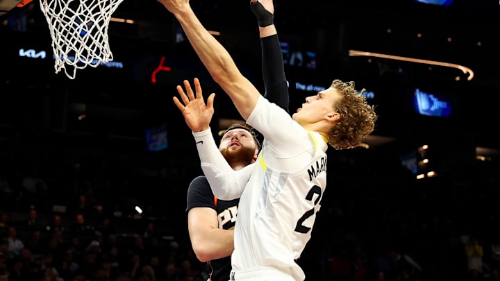 Feb 8, 2024; Phoenix, Arizona, USA; Utah Jazz forward Lauri Markkanen (23) shoots the ball against