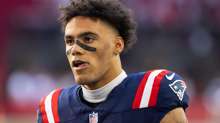 Dec 15, 2024; Glendale, Arizona, USA; New England Patriots cornerback Christian Gonzalez (0) against the Arizona Cardinals at State Farm Stadium. Mandatory Credit: Mark J. Rebilas-Imagn Images