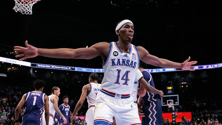 Mar 12, 2026; Kansas City, MO, USA; Kansas Jayhawks guard Melvin Council Jr. (14) guards an inbound during the second half against the TCU Horned Frogs at T-Mobile Center. Mandatory Credit: William Purnell-Imagn Images