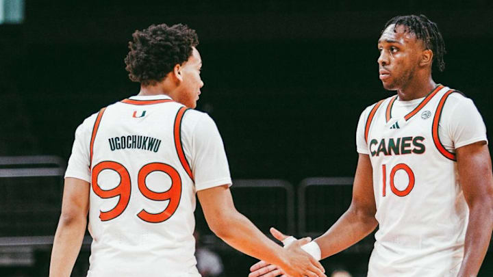 Divine Ugochukwu (99) and Paul Djobet (10) giving each other a high five after scoring.