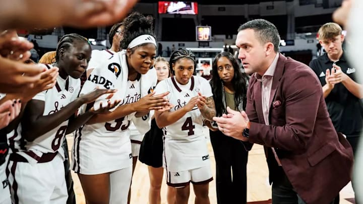 Mississippi State Head Coach Sam Purcell, Mississippi State Guard Awa Fane (#8), Mississippi State Forward Kharyssa Richardson (#33), Mississippi State Guard Trayanna Crisp (#4) and Mississippi State Assistant Women's Basketball Coach Samantha Williams during the game between the Mississippi Valley State Devilettes and the Mississippi State Bulldogs at Humphrey Coliseum in Starkville, MS.