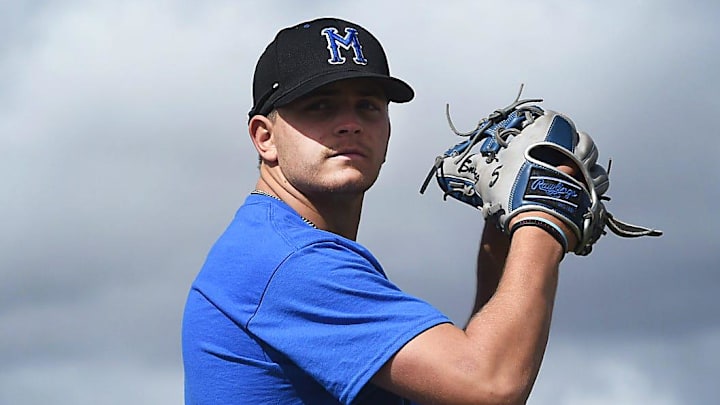 McQueen's Robby Snelling is seen pitching.
