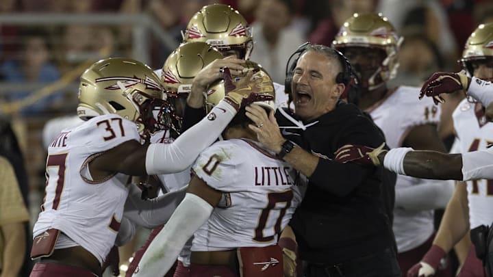 Oct 18, 2025; Stanford, California, USA;  Florida State Seminoles head coach Mike Norvell celebrates with defensive back Earl Little Jr. (0) during the first quarter against the Stanford Cardinal at Stanford Stadium. Mandatory Credit: Stan Szeto-Imagn Images