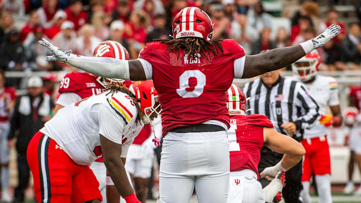 Indiana's CJ West (8) celebrates a stop during the Indiana versus Maryland football game at Memorial Stadium on Saturday, Sept. 28, 2024.