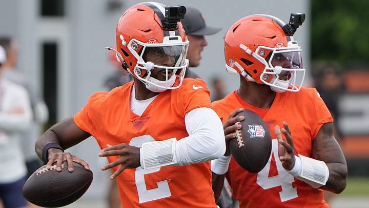 Cleveland Browns quarterbacks Shedeur Sanders, left, and Deshaun Watson