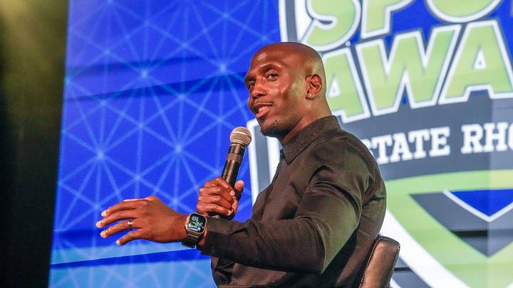 Devin McCourty on stage with Bill Koch and Eric Rueb. Devin McCourty on stage with Bill Koch and Eric Rueb.