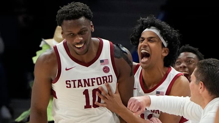 Mar 12, 2025; Charlotte, NC, USA; Stanford Cardinal forward Chisom Okpara (10) reacts with guard Ryan Agarwal (11) after scoring a basket and being fouled late in the second half at Spectrum Center. Mandatory Credit: Bob Donnan-Imagn Images Mar 12, 2025; Charlotte, NC, USA; Stanford Cardinal forward Chisom Okpara (10) reacts with guard Ryan Agarwal (11) after scoring a basket and being fouled late in the second half at Spectrum Center. Mandatory Credit: Bob Donnan-Imagn Images