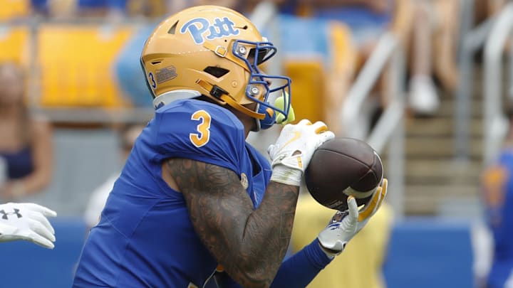 Aug 31, 2024; Pittsburgh, Pennsylvania, USA;  Pittsburgh Panthers defensive back Donovan McMillon (3) intercepts a Kent State Golden Flashes pass during the second quarter at Acrisure Stadium. Mandatory Credit: Charles LeClaire-Imagn Images