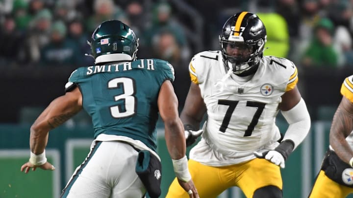 Dec 15, 2024; Philadelphia, Pennsylvania, USA; Pittsburgh Steelers offensive tackle Broderick Jones (77) blocks Philadelphia Eagles linebacker Nolan Smith Jr. (3) at Lincoln Financial Field. Mandatory Credit: Eric Hartline-Imagn Images