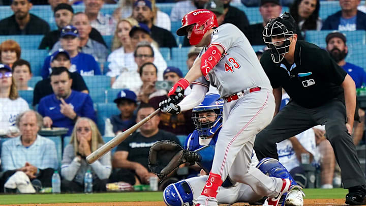 Cincinnati Reds first baseman Sal Stewart (43) hits a two-RBI single in the first inning of the MLB National League Wild Card Game 2 between the Cincinnati Reds and LA Dodgers, Wednesday, Oct. 1, 2025, at Dodger Stadium in Los Angeles, California.