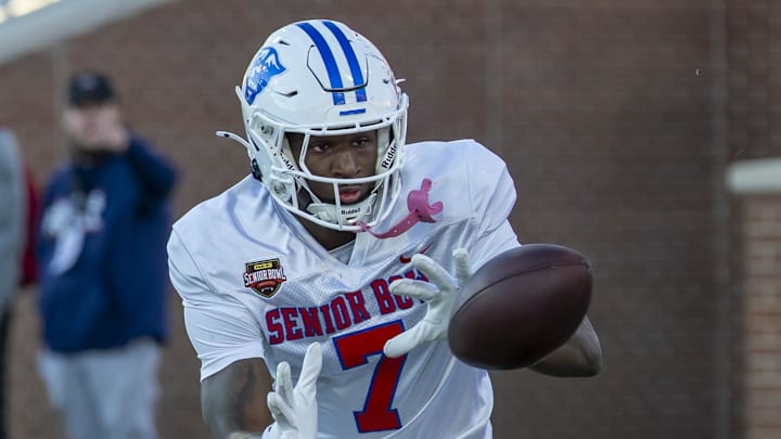 Jan 28, 2026; Mobile, AL, USA; American Team wide receiver Ted Hurst (7) of Georgia State works in passing drills during American Senior Bowl practice at Hancock Whitney Stadium.  