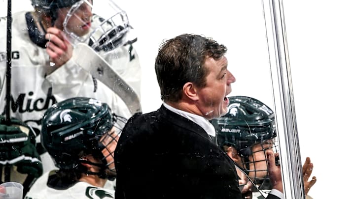 Michigan State's head coach Adam Nightingale calls out to players during the first period against Notre Dame in the Big Ten tournament on Saturday, March 15, 2025, at Muni Arena in East Lansing.