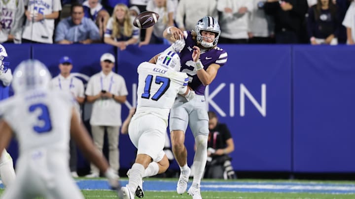 Sep 21, 2024; Provo, Utah, USA; Kansas State Wildcats quarterback Avery Johnson (2) has a pass deflected by Brigham Young Cougars linebacker Jack Kelly (17) during the second quarter at LaVell Edwards Stadium. Mandatory Credit: Rob Gray-Imagn Images Sep 21, 2024; Provo, Utah, USA; Kansas State Wildcats quarterback Avery Johnson (2) has a pass deflected by Brigham Young Cougars linebacker Jack Kelly (17) during the second quarter at LaVell Edwards Stadium. Mandatory Credit: Rob Gray-Imagn Images