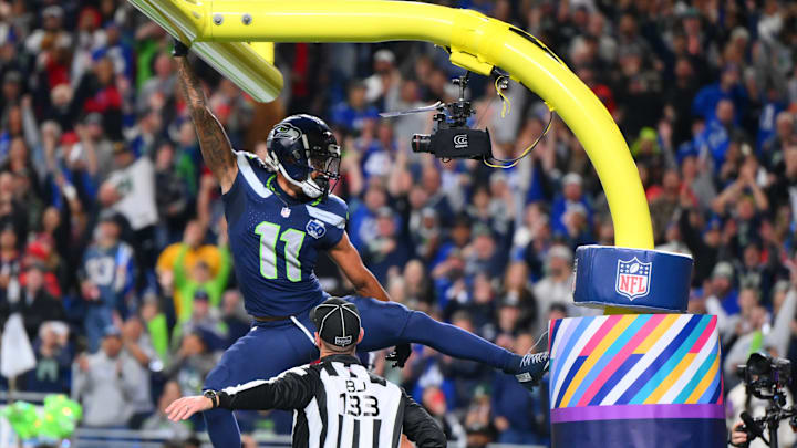 Oct 20, 2025; Seattle, Washington, USA; Seattle Seahawks wide receiver Jaxon Smith-Njigba (11) celebrates on the goal post after a touchdown during the first quarter against the Houston Texans at Lumen Field. Oct 20, 2025; Seattle, Washington, USA; Seattle Seahawks wide receiver Jaxon Smith-Njigba (11) celebrates on the goal post after a touchdown during the first quarter against the Houston Texans at Lumen Field.