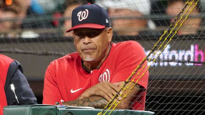 Washington Nationals interim manager Miguel Cairo (22) looks on against the San Francisco Giants during the seventh inning at Oracle Park. Washington Nationals interim manager Miguel Cairo (22) looks on against the San Francisco Giants during the seventh inning at Oracle Park.