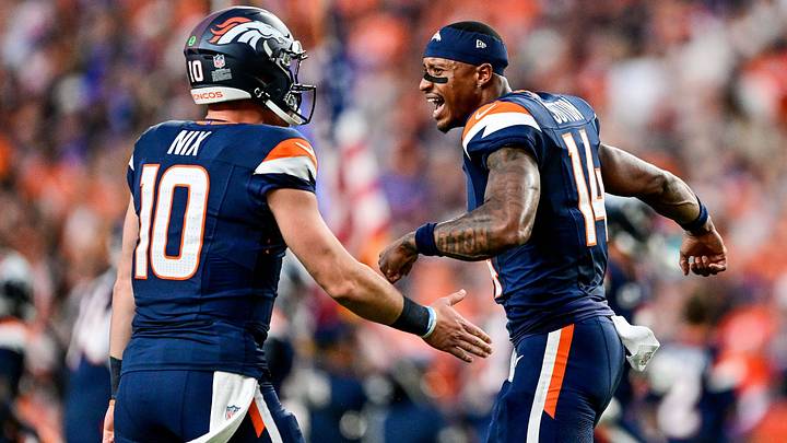 DENVER, CO - SEPTEMBER 27: Denver Broncos quarterback Bo Nix 10 and wide receiver Courtland Sutton 14 come onto the field during player introductions before a game between the Los Angeles Rams and the Denver Broncos at Empower Field at Mile High on September 27, 2026 in Denver, Colorado. 