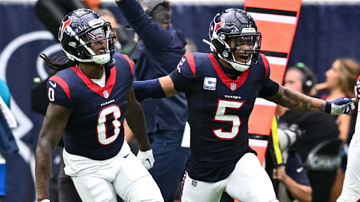 Oct 15, 2023; Houston, Texas, USA; Houston Texans cornerback Shaquill Griffin (0) and safety Jalen Pitre (5) react during the fourth quarter against the New Orleans Saints at NRG Stadium. Mandatory Credit: Maria Lysaker-Imagn Images
