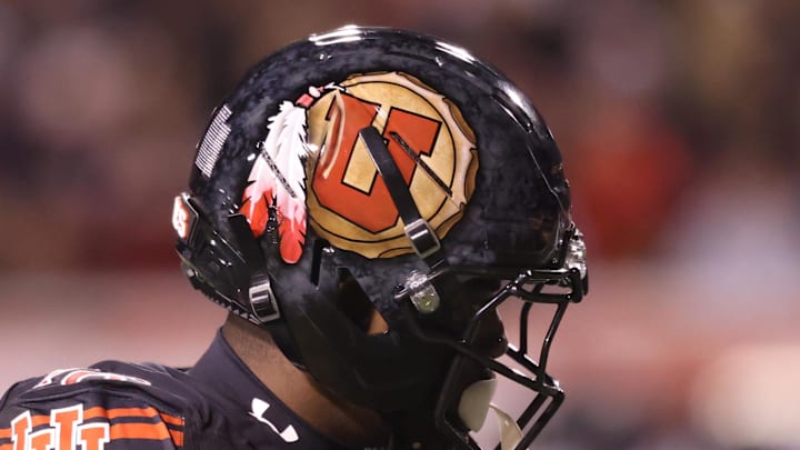 A view of the hand painted helmet worn by Utah Utes cornerback Blake Cotton (16) during the second half of a game against the Cincinnati Bearcats at Rice-Eccles Stadium. A view of the hand painted helmet worn by Utah Utes cornerback Blake Cotton (16) during the second half of a game against the Cincinnati Bearcats at Rice-Eccles Stadium.
