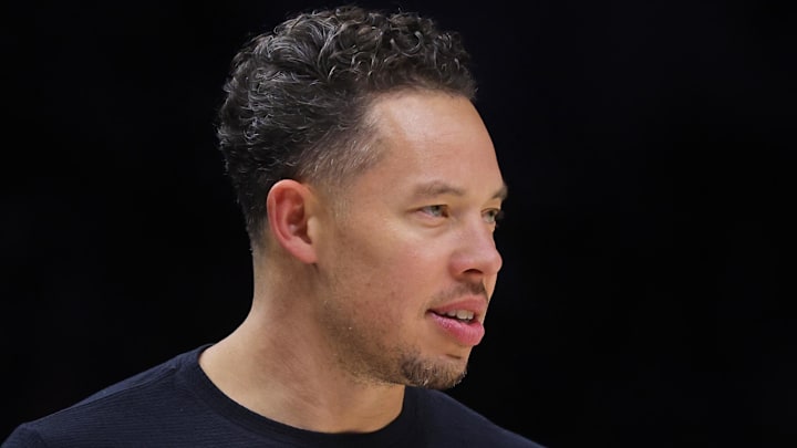 May 10, 2026; Minneapolis, Minnesota, USA; San Antonio Spurs head coach Mitch Johnson watches as his team plays the Minnesota Timberwolves in the third quarter of game four of the second round of the 2026 NBA Playoffs at Target Center. Mandatory Credit: Bruce Kluckhohn-Imagn Images