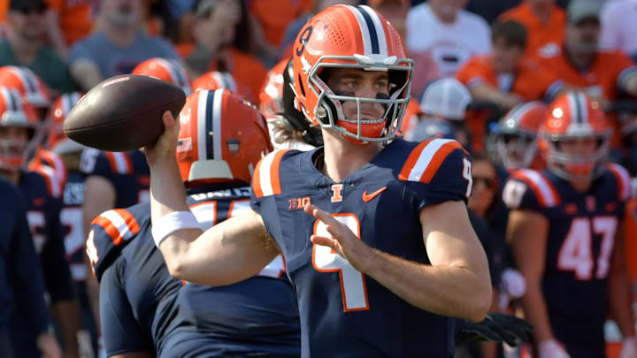 Oct 12, 2024; Champaign, Illinois, USA; Illinois Fighting Illini quarterback Luke Altmyer (9) passes the ball in the first half against the Purdue Boilermakers at Memorial Stadium. Mandatory Credit: Ron Johnson-Imagn Images Oct 12, 2024; Champaign, Illinois, USA; Illinois Fighting Illini quarterback Luke Altmyer (9) passes the ball in the first half against the Purdue Boilermakers at Memorial Stadium. Mandatory Credit: Ron Johnson-Imagn Images