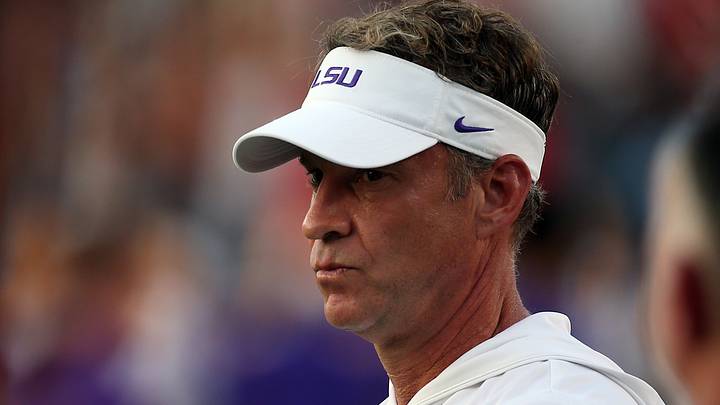 LSU Tigers head coach Lane Kiffin looks on during warm ups prior to the game against the Mississippi Rebels at Vaught-Hemingway Stadium. 