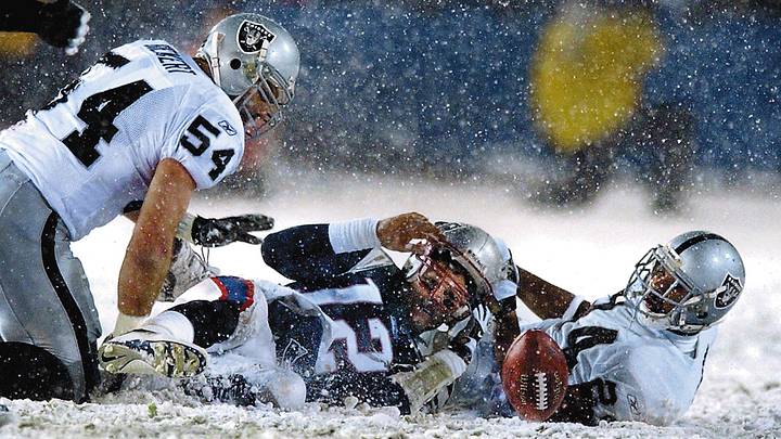 New England Patriots host the Oakland Raiders in an AFC playoff game at Foxboro Stadium.