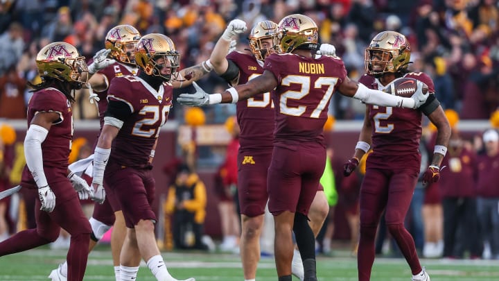 Nov 4, 2023; Minneapolis, Minnesota, USA; Minnesota Golden Gophers defensive back Tyler Nubin (27) celebrates his interception against the Illinois Fighting Illini during the second half at Huntington Bank Stadium. Nov 4, 2023; Minneapolis, Minnesota, USA; Minnesota Golden Gophers defensive back Tyler Nubin (27) celebrates his interception against the Illinois Fighting Illini during the second half at Huntington Bank Stadium.