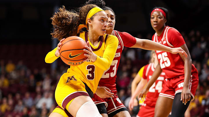 Minnesota Golden Gophers guard Amaya Battle (3) works around Wisconsin Badgers guard D'Yanis Jimenez (23) during the first half at Williams Arena.