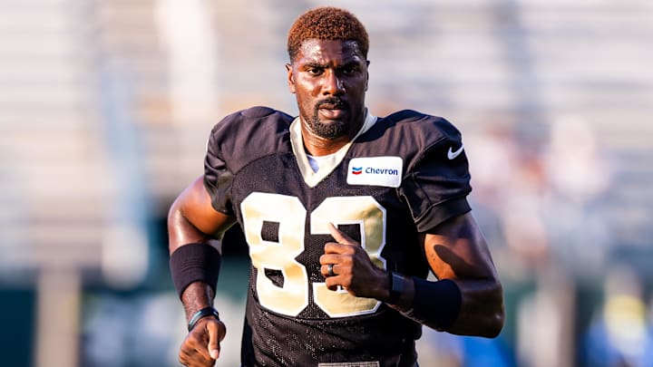 Aug 20, 2024; New Orleans, LA, USA;  New Orleans Saints tight end Juwan Johnson (83) warms up during practice at Yulman Stadium (Tulane). Mandatory Credit: Stephen Lew-USA TODAY Sports