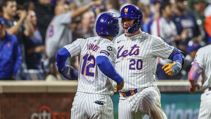 Sep 3, 2024; New York City, New York, USA;  New York Mets first baseman Pete Alonso (20) celebrates with shortstop Francisco Lindor (12) after hitting a two-run home run in the eighth inning against the Boston Red Sox at Citi Field. Mandatory Credit: Wendell Cruz-Imagn Images