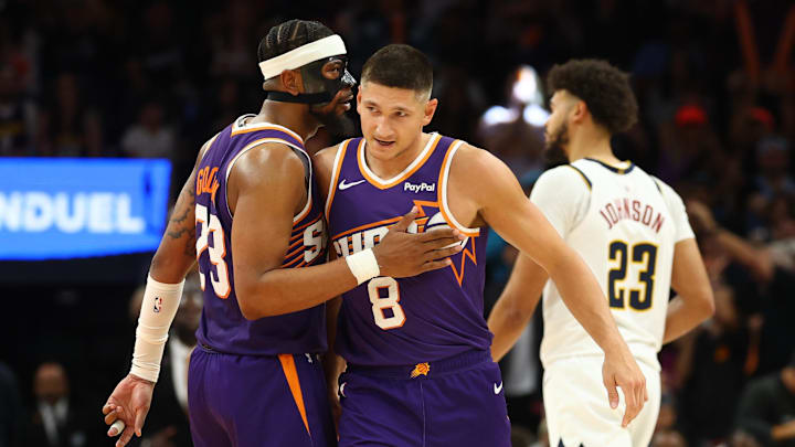 Mar 24, 2026; Phoenix, Arizona, USA; Phoenix Suns guard Grayson Allen (8) celebrates with teammate Jordan Goodwin (23) against the Denver Nuggets in the second half at Mortgage Matchup Center. Mandatory Credit: Mark J. Rebilas-Imagn Images Mar 24, 2026; Phoenix, Arizona, USA; Phoenix Suns guard Grayson Allen (8) celebrates with teammate Jordan Goodwin (23) against the Denver Nuggets in the second half at Mortgage Matchup Center. Mandatory Credit: Mark J. Rebilas-Imagn Images