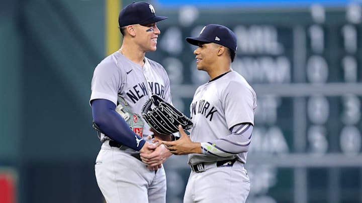 Mar 31, 2024; Houston, Texas, USA; New York Yankees center fielder Aaron Judge (99) and New York Yankees right fielder Juan Soto (22) stand next to each other during an umpire's review against the Houston Astros during the fourth inning at Minute Maid Park. Mandatory Credit: Erik Williams-USA TODAY Sports