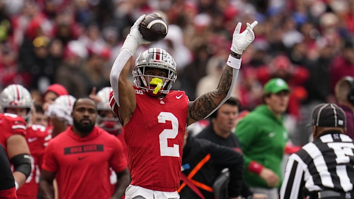 Ohio State Buckeyes wide receiver Emeka Egbuka (2) celebrates a first down catch during the second half of the NCAA football game against the Indiana Hoosiers at Ohio Stadium in Columbus on Saturday, Nov. 23, 2024. Ohio State won 38-15.