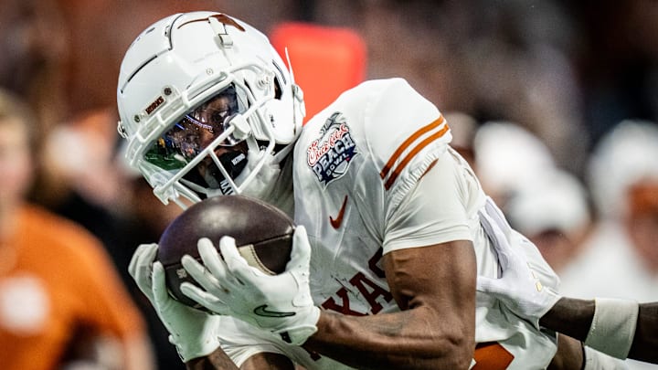 Texas Longhorns wide receiver Matthew Golden (2) catches a long pass for a first down near the end zone in the fourth quarter as the Texas Longhorns play the Arizona State Sun Devils in the Peach Bowl College Football Playoff quarterfinal at Mercedes-Benz Stadium in Atlanta, Georgia, Jan. 1, 2025.